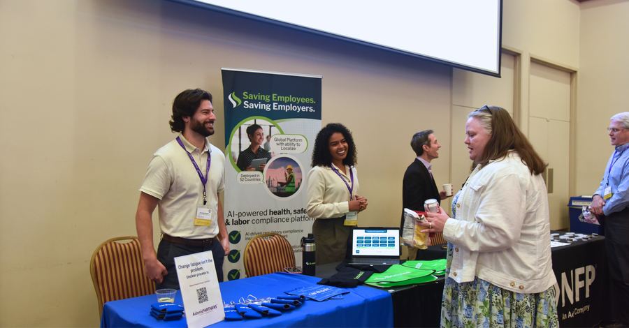 2027 Leadership & HR Conference | Concord, NC 9 Sponsor team engaging with attendees at their table