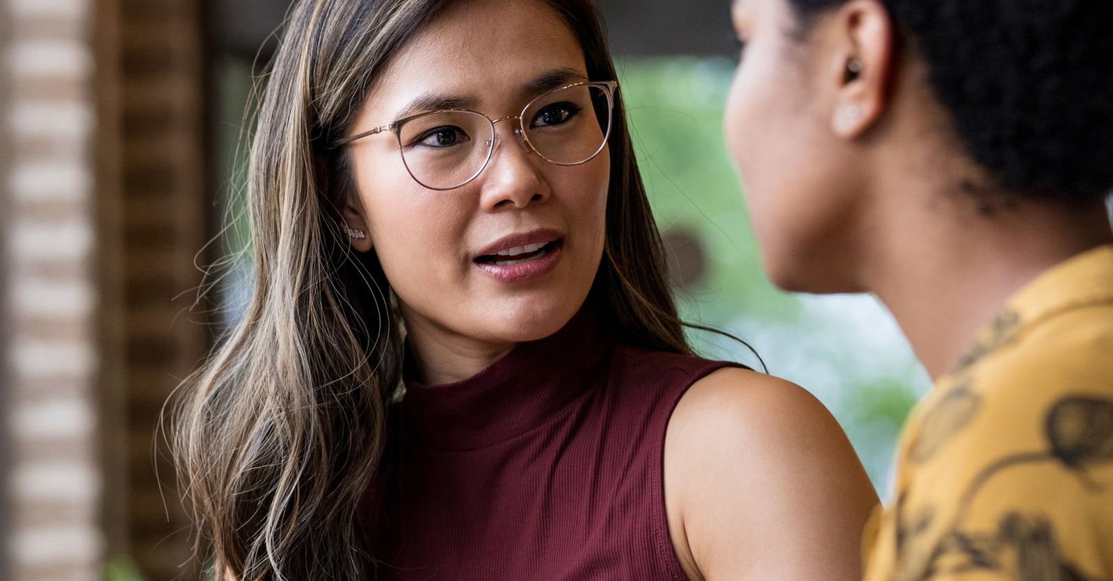 A manager talking with an employee across a table
