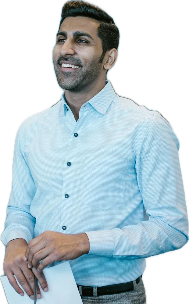 HR Consulting, Compliance & Benefits Services 2 A team leader smiling while running a team huddle