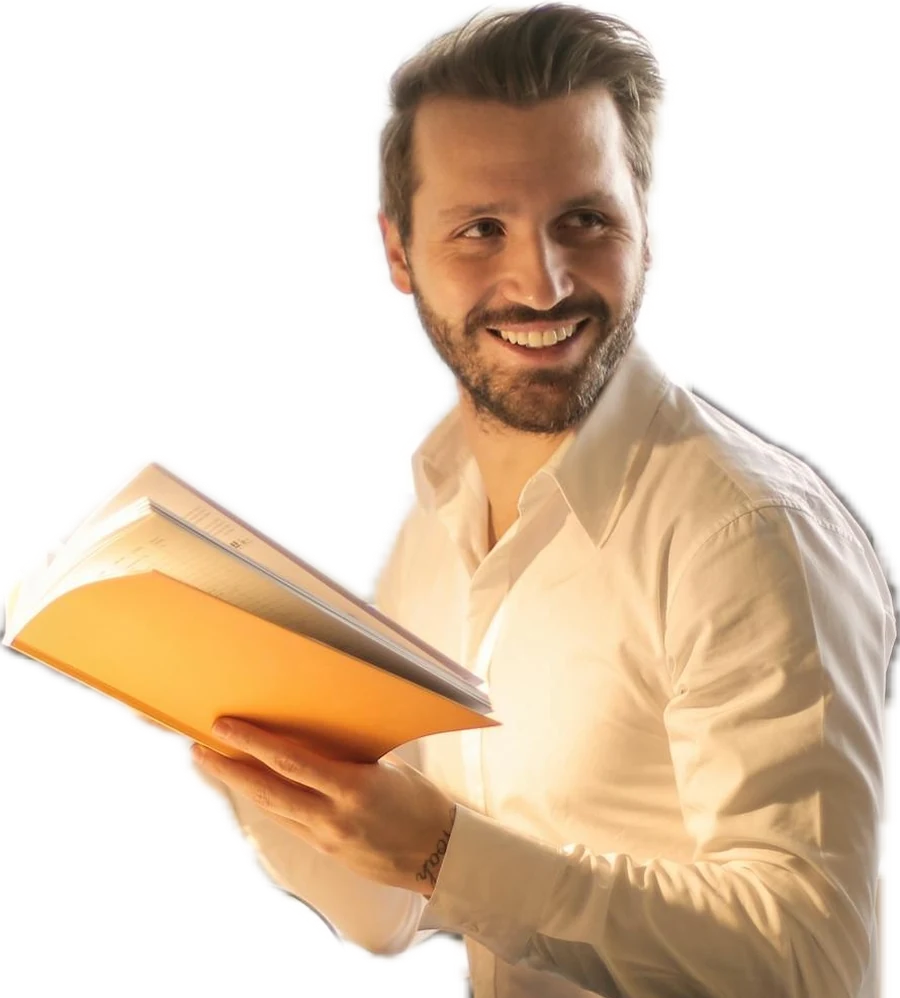Founders 2 A founder smiling while reviewing notes